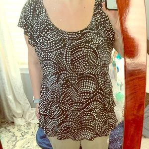 Black top with white polka dots